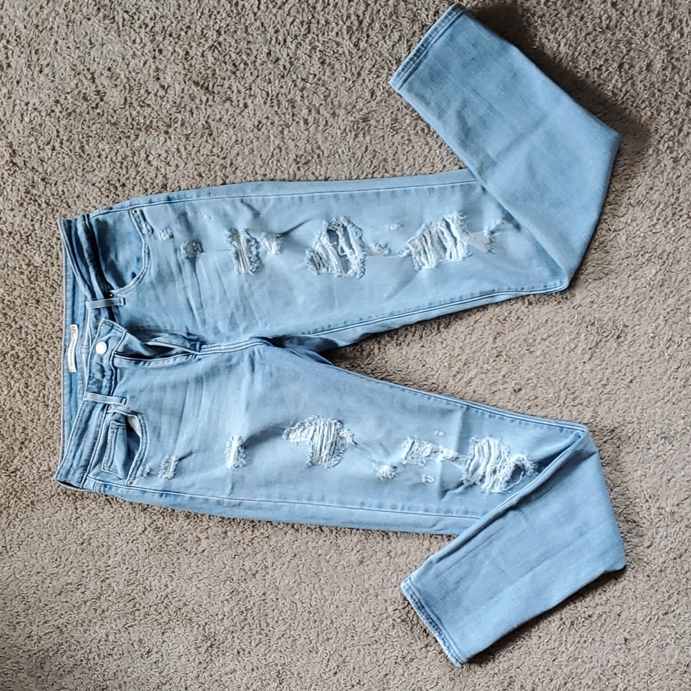 Light wash distressed Levi skinny jeans